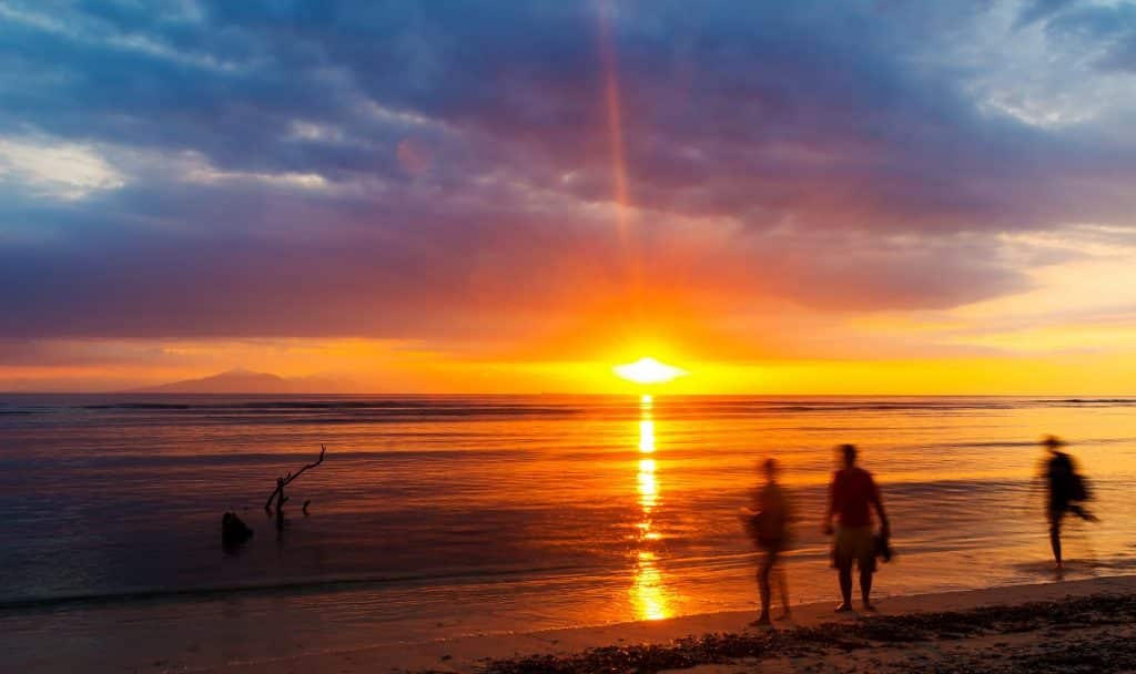 People Watching Sunset Over Bali